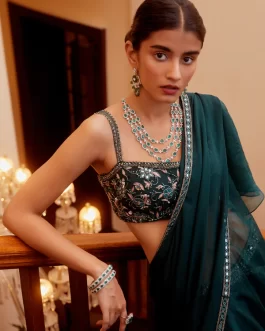 TEAL GREEN RUFFLE SAREE AND BUSTIER